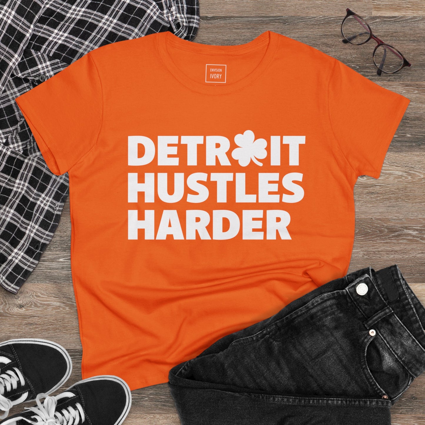 Detroit Hustles Harder Women's Tee: Embrace the Motor City Spirit